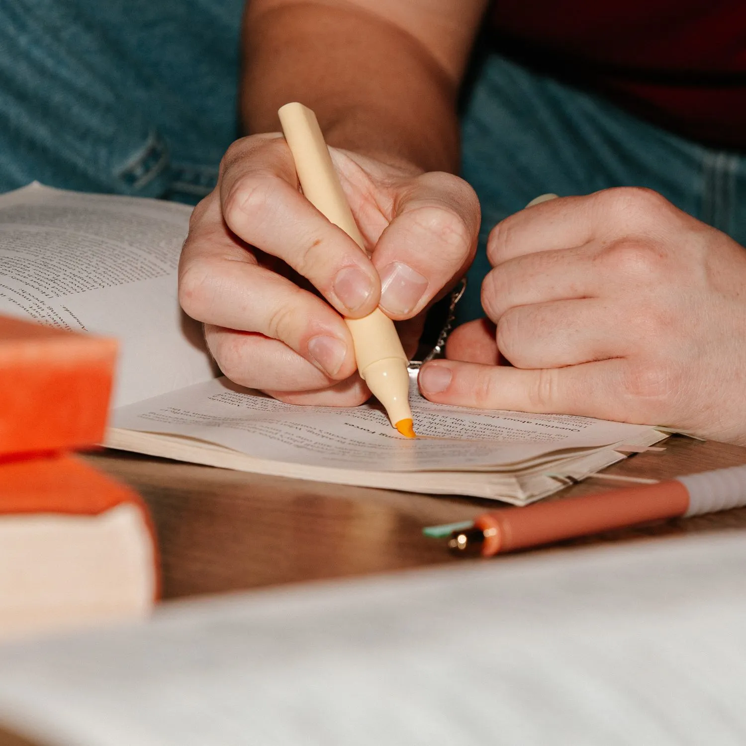 book reading aesthetics with a reader highlighting a passage in book