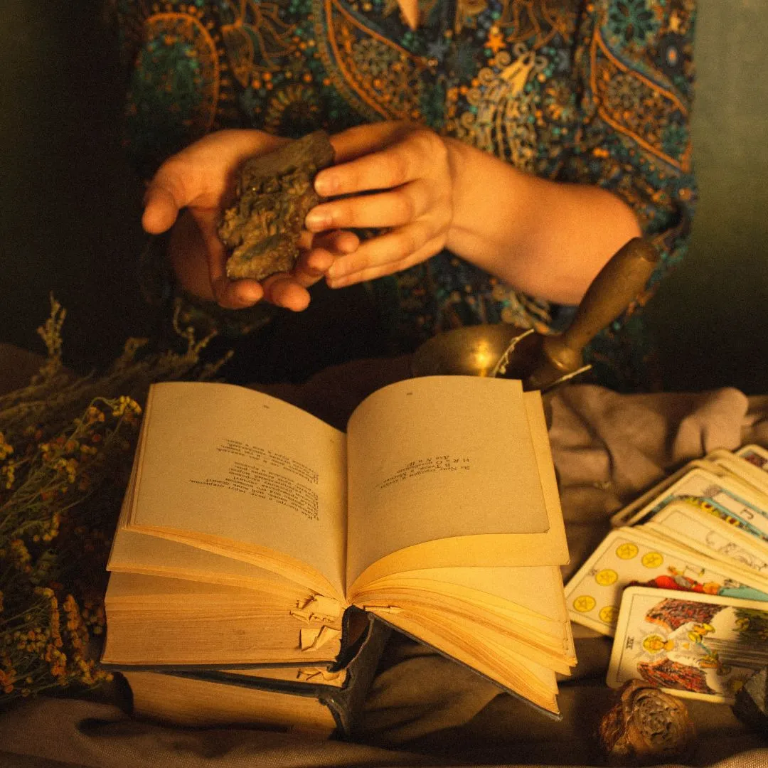 a sorcerer girl reading a book