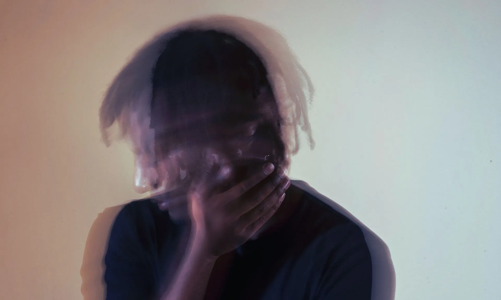 a depressed man with blurry effect