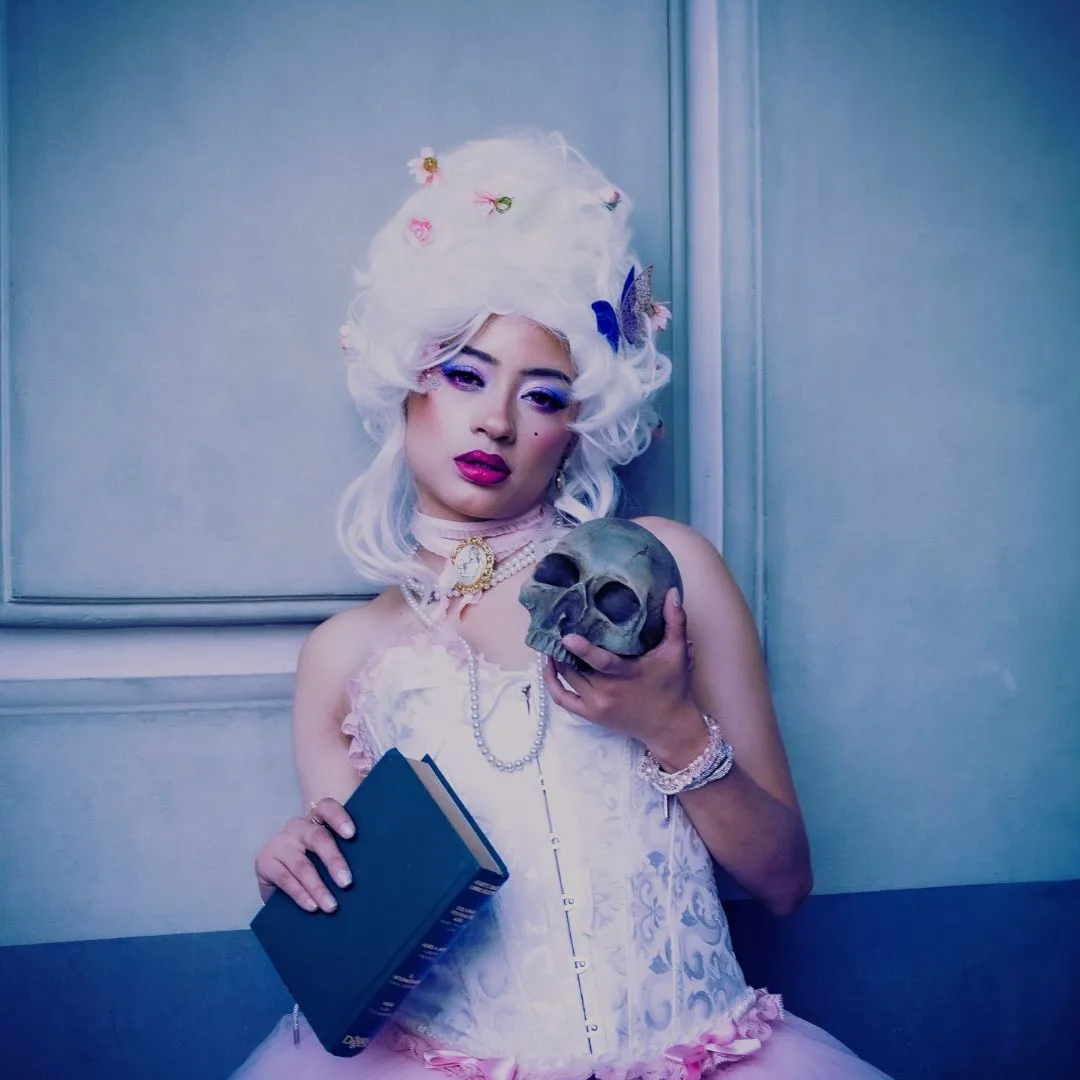 girl with a book and skull