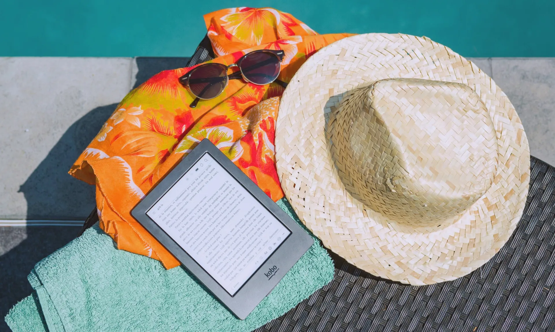 digital reading beside swimming pool