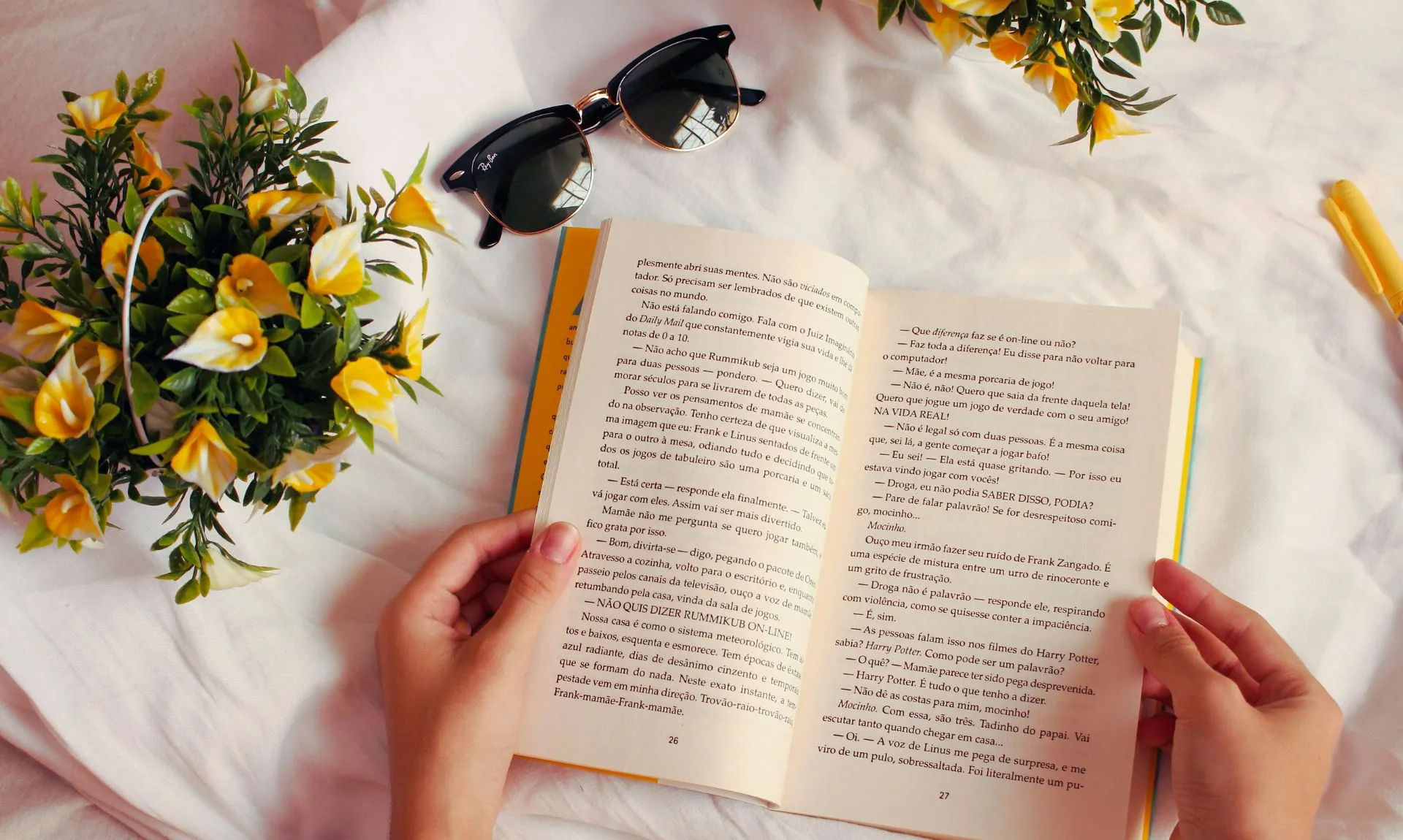 reading classic book with a bunch of flowers